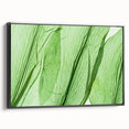 Black and white framed canvas featuring a close-up of leaves, ideal for bedroom wall decor.
