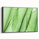 Black and white framed canvas featuring a close-up of leaves, ideal for bedroom wall decor.