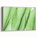 Framed canvas landscape art painting featuring close-up of leaves in shades of green and silver.