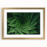Extra large abstract art print featuring close-up leaves in textured greens and yellows, framed in gold.