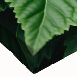 Large art depicting a close-up of leaves, in black and white tones on stretched canvas, suitable for bedroom wall decor.