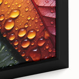 Close-up of textured leaves on black framed canvas, featuring vibrant green and yellow tones, ideal for living room decor.