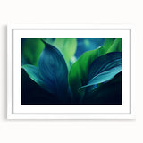 Abstract art print of close-up leaves in green and brown hues on a white framed canvas, ideal for dining room decor.