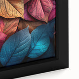 Extra large black wall art featuring a close-up of textured leaves in colorful hues, framed canvas.