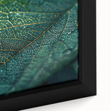 Close-up of textured black wall art featuring colorful leaves design on a framed canvas, ideal for living room decor.