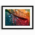 Colorful abstract art print featuring a close-up of textured leaves in green and yellow, framed in black.