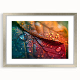 Close-up textured art of abstract leaves in muted green and brown, framed in silver, ideal for bedroom art.