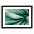 Extra large abstract art print of colorful, textured leaves on a black framed canvas, suitable for living room decor.