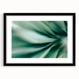 Extra large abstract art print of colorful, textured leaves on a black framed canvas, suitable for living room decor.