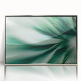 Mid-century modernist art of silver-framed acrylic leaves in muted green tones, suitable for nursery wall art.