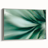 Framed canvas depicting a close-up of leaves in vibrant green tones, ideal for adding a natural element to a living room.