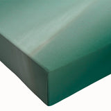 Close-up of large art featuring leaves in black and white on stretched canvas, suitable for bedroom wall decor.