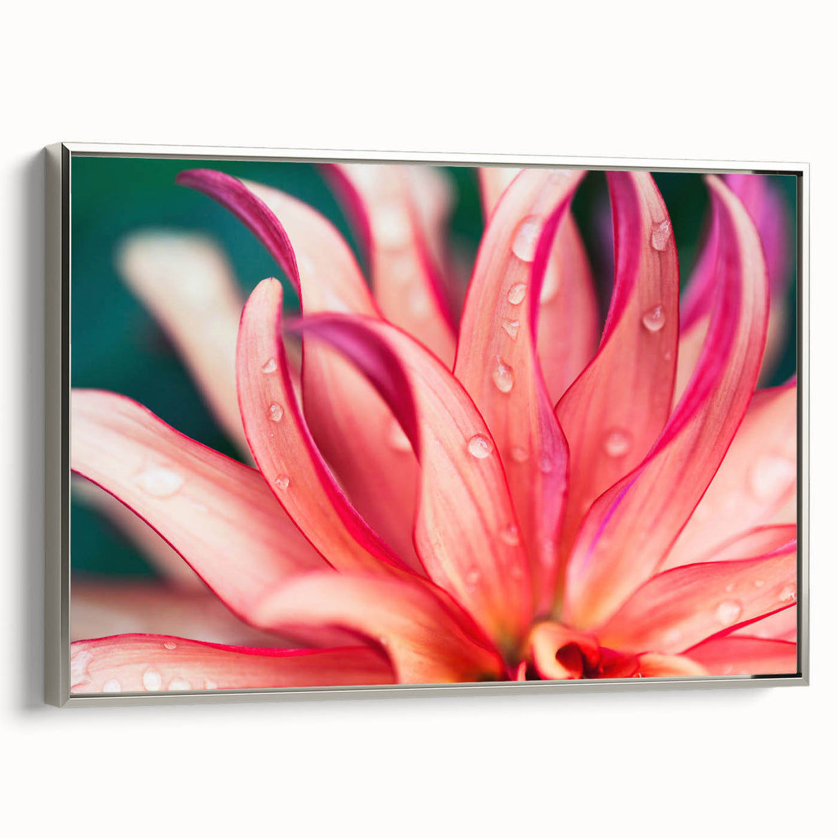 Framed canvas of a vintage landscape painting featuring colorful leaves against a black background.