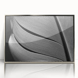 Acrylic print of close-up leaves in silver frame, featuring mid-century modernist style, ideal for nursery wall art.
