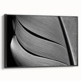 Black and white framed canvas featuring a close-up of leaves, ideal for bedroom wall decor.