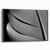 Black and white framed canvas featuring a close-up of leaves, ideal for bedroom wall decor.