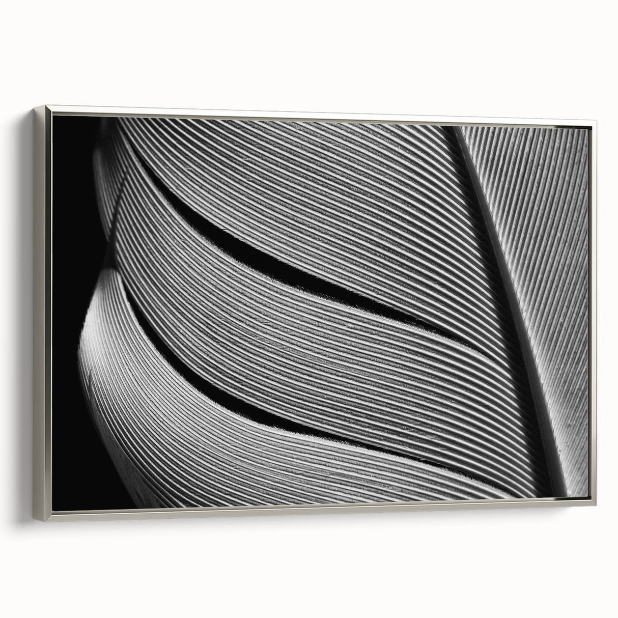 Framed canvas featuring close-up of leaves in vibrant green and yellow tones, ideal for brightening a living room.