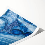 Extra large wall art featuring line art flowers in black and white on a rolled canvas.