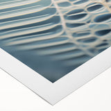 Art deco poster featuring a close-up of natural elements in muted green and brown tones on rolled canvas.