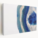 Close-up image of natural elements in green and brown on a stretched canvas, suitable for kitchen wall art.