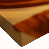 Large art of a black and white landscape painting on stretched canvas, featuring a detailed tree bark texture.