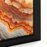 Close-up of textured black wall art featuring colorful natural elements on a framed canvas, ideal for living room decor.