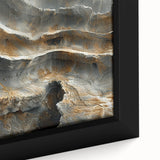 Close-up of textured black wall art featuring vibrant natural elements on a framed canvas, suitable for living room decor.