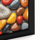Close-up of black wall art featuring colorful, textured natural elements on a framed canvas, ideal for living room decor.