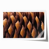 Close-up of floral elements in muted earth tones on a rolled canvas, suitable as art wall dining room decor.