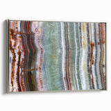 Framed canvas featuring a vintage landscape art painting with colorful elements on a black background.