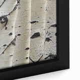 Extra large framed canvas featuring a close-up of a tree in black with colorful, textured brush strokes.