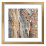 Extra large abstract art print of close-up tree textures in muted earth tones, framed in gold, ideal for living room decor.