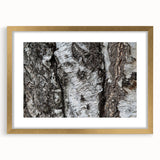 Extra large abstract art print of textured trees, with muted green and brown tones on a gold-framed canvas.