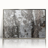 Mid-century modernist art depicting close-up trees in muted earth tones on a framed acrylic.