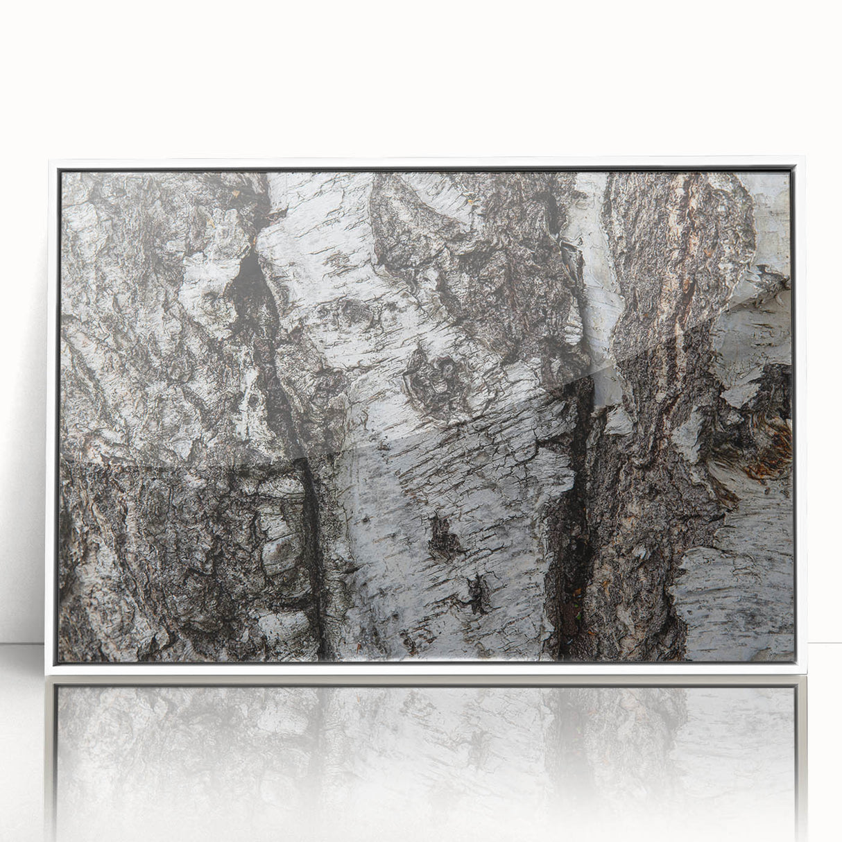 Acrylic print of close-up tree design in muted green and brown, framed in white, suitable for modern nursery decor.