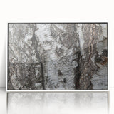 Acrylic print of close-up tree design in muted green and brown, framed in white, suitable for modern nursery decor.