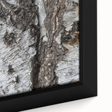 Close-up black wall art of trees, textured with vibrant colors on a framed canvas, ideal for living room decor.