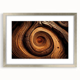 Textured art of abstract tree close-ups in muted earth tones, framed in silver, ideal for bedroom wall decor.