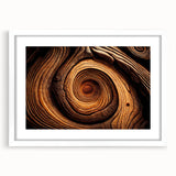 Abstract art print of close-up tree branches in muted gray tones on a framed white mat.