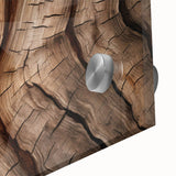 Large abstract wall art featuring close-up tree designs in muted green tones on acrylic glass.