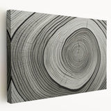 Close-up of tree bark on a stretched canvas, featuring intricate textures and natural brown tones.