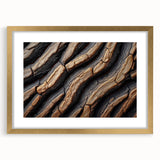 Extra large abstract art print featuring a close-up of textured tree designs in muted earth tones, framed in gold.
