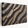 Close-up of tree bark on a large stretched canvas, displaying intricate textures in earthy tones.