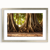 Textured art print of abstract tree designs in muted green and brown, framed in silver, ideal for bedroom wall decor.