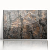 Acrylic print of close-up tree designs in muted green and brown, framed in white, suitable for modern nursery decor.