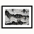 Colorful abstract art print of close-up tree textures in a black frame, ideal for extra large wall art in a living room.