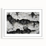 Abstract art print of close-up tree designs in muted green and brown tones on a white framed canvas.