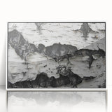 Acrylic print of close-up tree designs in muted green and brown tones, framed in white.