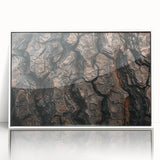 Acrylic print of close-up tree design in muted green and brown tones, framed in white, suitable for modern nursery decor.