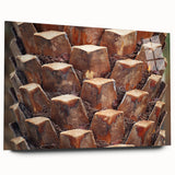 Acrylic print of large abstract wall art featuring close-up tree designs in muted green and brown.